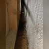 In Nichola's basement, he had cosmetic walls installed in front of the foundation walls to finish his basement. But after some time, he began to notice some water in one area, so after looking between the two walls, he discovered there was a large crack running up the foundation wall.