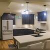 Fully functional Kitchen with Fridge, Oven, Dishwasher, and outlets for other appliances.