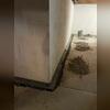 WaterGuard channels are carefully laid along the perimeter to intercept moisture and direct it to the sump pump.