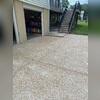 Tiny holes are drilled into the concrete with specialized equipment.