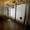 With the sump pump fully installed, this basement now has a reliable solution to handle water intrusion during heavy rains.