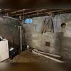 The basement before being waterproofed.