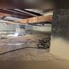 The spray foam was trapping the water in this crawl space with no safe way out.