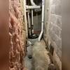 Although the existing sump pump in the basement remained operational, it lacked the capacity to effectively manage groundwater intrusion caused by the high water table. Due to its limited performance, a more comprehensive and robust waterproofing system was necessary to ensure consistent moisture...