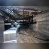 This photo shows the initial moisture control setup featuring a high-efficiency dehumidifier placed in a prepped crawl space. The liner is in place along the floor, and wall insulation is underway with reinforced vapor barrier material. This stage of the encapsulation process is key to controlling...