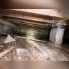 In this section of the crawlspace, the existing vapor barrier is torn, displaced, and showing significant wear after years of service. This leaves the soil exposed, allowing ground moisture to evaporate into the air and contribute to high humidity levels beneath the home. Combined with being...