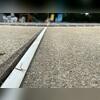 Moisture intrusion and shifting soil beneath the concrete caused voids to form, leading to the settlement of this homeowner's pool deck and creating uneven, unstable surfaces.