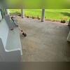 Concrete settlement has caused cracks in this porch.