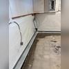 This photo shows the WaterGuard track in position, giving a behind-the-scenes look at how basement water gets stopped at the source.