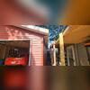 Before the installation of Gutter Shutter, this garage lacked a proper gutter system. This absence allowed rainwater to directly impact the foundation and lower walls, significantly increasing the risk of costly water damage to the structure and its integrity.