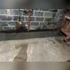 Our crew completed the WaterGuard drainage system and sealed it with fresh concrete for a clean look.