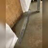 TrenchDrain is installed in front of the basement door that leads outside to catch excess and surface water. It is connected to the WaterGuard drainage system.