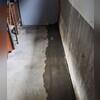 WaterGuard is installed along the perimeter of the basement floor and covered in fresh concrete to provide a seamless finished look and the WaterGuard Port is left visible to provide access to the system when needed.