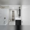 Lovely Remodeled Basement Bathroom with newly installed ceiling lighting and a beautiful new vanity countertop sink!!
