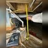 Our team takes precise measurements inside the crawl space to ensure accurate placement of SmartJack® supports and supplemental beams.