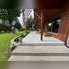 The front porch concrete before the Durastone upgrade, showing a plain, weathered surface ready for a fresh look.