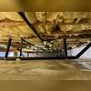 A finished Prescott, AZ crawlspace with bright, sealed surfaces and improved storage potential thanks to professional encapsulation.