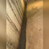 Our crew completed the WaterGuard drainage system and sealed it with fresh concrete for a clean look.