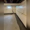 This clean concrete finish marks the final step in our WaterGuard installation, a hidden drainage system now working around the clock to keep this basement dry.