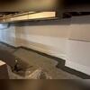 Once we fitted the trenches with our WaterGuard drains, we then concealed them with a fresh layer of concrete. We also installed our CleanSpace vapor barrier up from the drainage system to cover the weeping holes and help channel water straight down into the system.