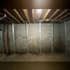 Installed PowerBraces provide immediate support to stop inward wall movement and protect the home's foundation.