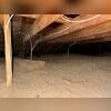 You can see the thin amount of insulation in this attic- and how old it is.