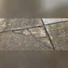 The cracks are drilled, smoothed, and prepped with non-absorbent backer rod filler. NexusPro sealant is then applied to the crack or control joint. To finish, a thin layer of native sand is added, giving the concrete a clean, uniform look.