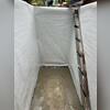 CleanSpace was installed on the walls to keep the moisture and humidity from the walls from filtering into the basement and weakening the supports and creating an unstable environment.