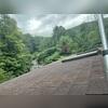 The porch roof had the wrong type of skylight installed, deck-mounted instead of curb-mounted, which caused leaks over time