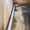 Here you can see the WaterGuard system set in place along the perimeter trench, ready to redirect water before it ever reaches your basement floor.