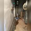 Installation progress of the sump pump system.