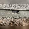 Mid‑process build‑back with fresh cement re‑establishes the profile. If you're asking "what is a stem wall?" or "what is a stem wall foundation?", this phase shows the stemwall being rebuilt so the stem wall foundation can perform like new.