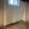 CleanSpace was installed on the walls to keep the moisture and humidity from the walls from filtering into the basement and weakening the supports and creating an unstable environment.