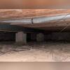 The crawl space used to have major humidity and moisture issues.