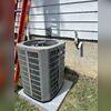 This also looks great and it is almost silent when it operates. The 2-in PVC pipes you see coming through the wall behind the AC are the intake and vent pipe terminations for the new furnace.