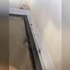 This is the crucial step that keeps future water out: WaterGuard set right along the foundation wall.