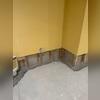 A precise trench was opened along the foundation wall to allow proper placement of the interior drainage line.