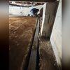 WaterGuard was installed along the perimeter of the basement to capture any seeping water and direct it to the sump pump for removal.