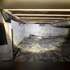 Moisture, mold and falling, failing insulation are problems in this crawl space, which hasn't been properly sealed. The encapsulation treatment totally separates and protects the crawl space interior from outdoor conditions, keeping the space clean and dry.