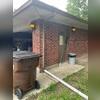 This corner of the garage was where the foundation was sinking. You can see the refrigerator the homeowner put over the door frame inside of the garage through the window to alert guests that the door was inaccessible.