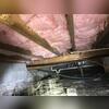 The large wooden beam running horizontally in this picture was sagging due to insufficient concrete support columns. This photo was taken upon the initial inspection.