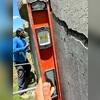 This picture taken during the installation process shows just how unlevel this wall really was. It also gives a good glimpse into the depth of the crack.