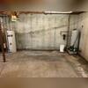 Due to ongoing water intrusion, the basement environment was at increased risk for microbial growth, wood deterioration, and damage to stored belongings and utilities.