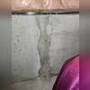 Another company covered wall crack with concrete. Concrete is not flexible. It re-cracks and re-leaks.