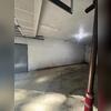 This garage wall in Harmony was bowing under pressure, creating a serious concern.