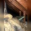 This rolled insulation was not placed correctly to insulate the attic space correctly.