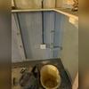 The WaterGuard is placed, surrounded with clean gravel, and the container is set in place for the sump pump.