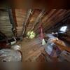 This dusty, empty attic was causing high humidity and uncomfortable temperatures for the homeowner.