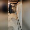 When it rained, water was seeping into the basement, leaving behind water stains and brown spots. She thought that just replacing her sump line would be the fix for this issue, but more needed to be done.