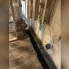 WaterGuard was installed around the perimeter of the basement and sits up against the wall to collect any water seepage from the walls and floors to direct towards the sump pump for removal.
